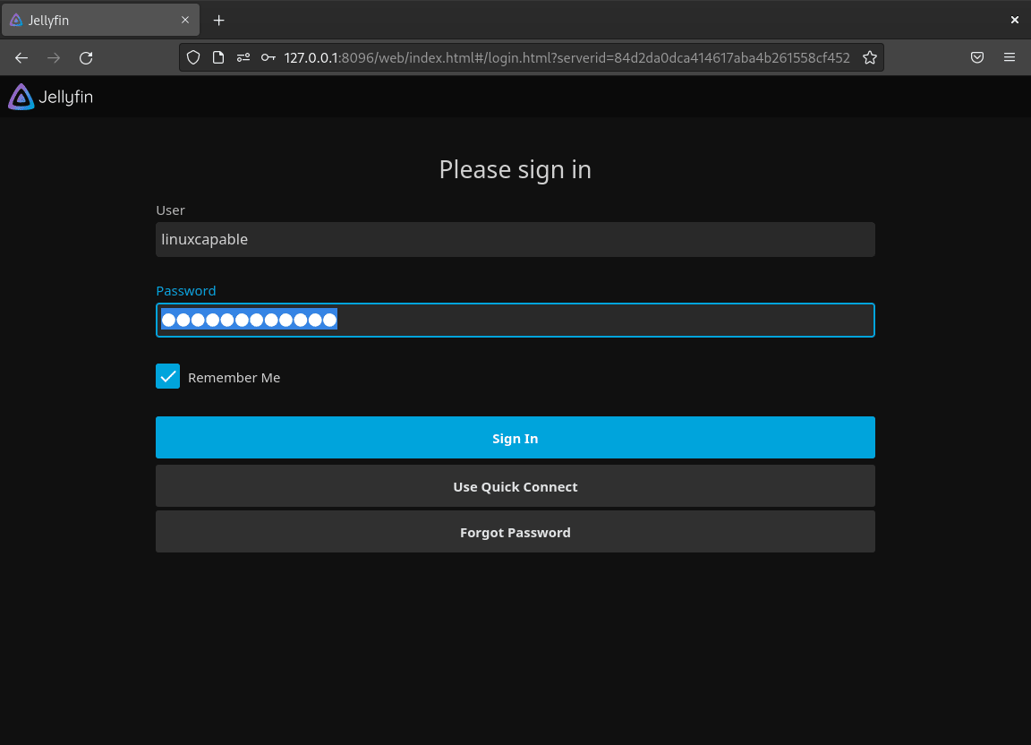 Jellyfin Media Server WebUI login screen on Debian Linux, showing fields to log in with the admin account created during setup.