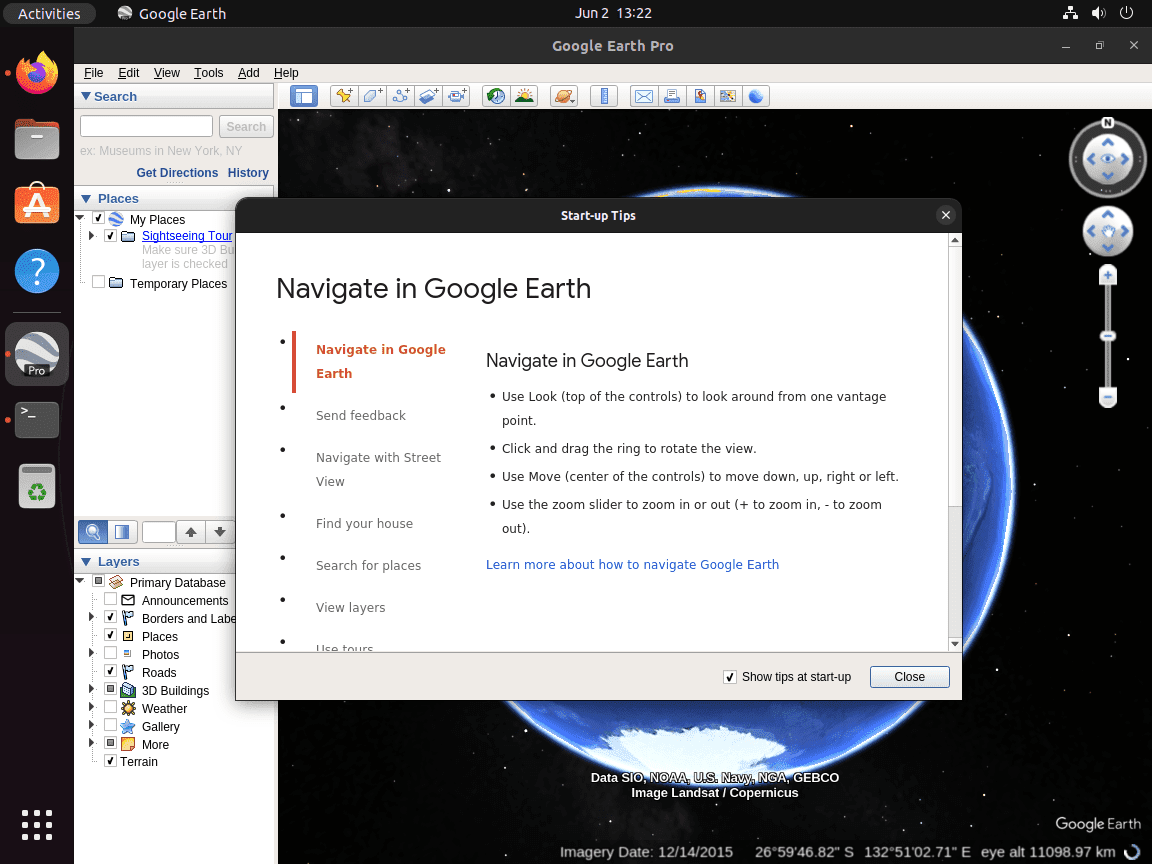 Startup tips displayed in Google Earth Pro on Ubuntu Linux, showing navigation instructions like rotating and zooming.