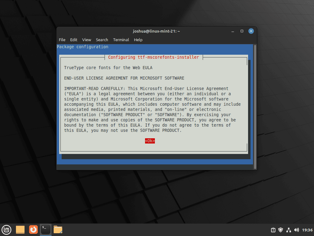 Terminal dialog showing Microsoft TrueType Core Fonts EULA license agreement text during package installation.